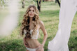 © irinaneva - beautiful sexy blonde girl posing in white lace underwear in the garden