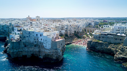 Wall Mural - Aerial photo shooting with drone on Polignano a Mare, famous Salento city on the Mediterranean sea