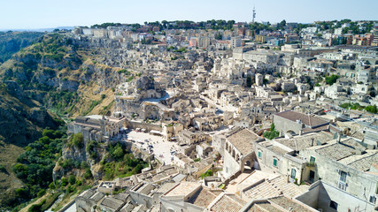 Wall Mural - Aerial photo shooting with drone of Matera, a famous Italy town for houses of stones, is one of the Italian sites inscribed in the UNESCO World Heritage List