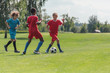 © LIGHTFIELD STUDIOS - selective focus of multicultural children playing football