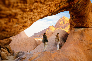 Wall Mural - Family hiking in Spitzkoppe Namibia