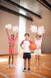 © zinkevych - Girls practicing cheerleading standing near classmate