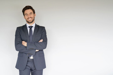 Businessman standing on white background