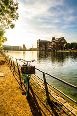 Wall Mural - Fahrrad am Zaun am See