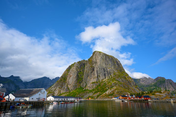 Sticker - Blue skies with mountains and fishing villages at Hamnoy, Reine, Norway.