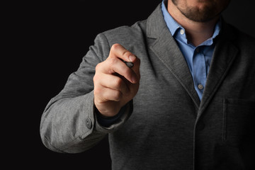 Poster - Caucasian man touching transparent board with stylus pen