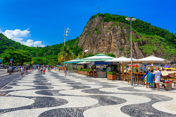 Canvas Print - View of Copacabana beach and Leme beach with palms and mosaic of sidewalk in Rio de Janeiro, Brazil