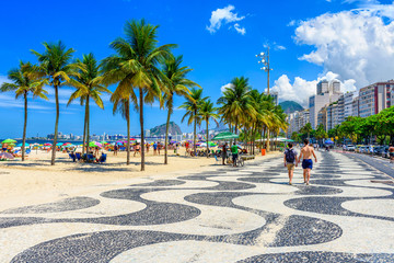 Fototapete - View of Copacabana beach and Leme beach with palms and mosaic of sidewalk in Rio de Janeiro, Brazil
