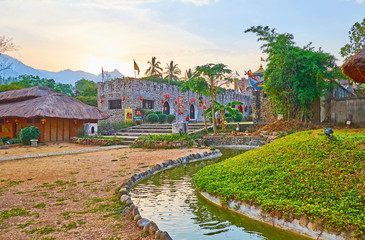 Wall Mural - Sunset over Santichon tea village, Thailand