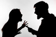 © satura_ - Aggression and abuse concept - man and woman expressing domestic violence in studio silhouette isolated on white background.