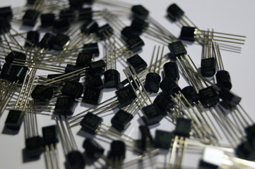 Close up of small black transistor 