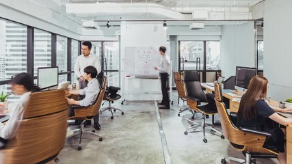 4K time-lapse of young adult Asian business people work together in office, zoom in. People working life, company workplace, teamwork activity, financial or marketing team meeting conference concept