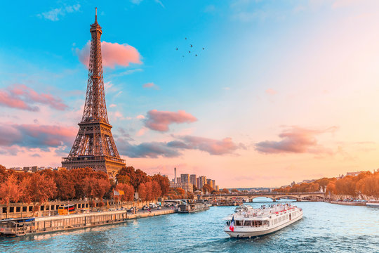 the main attraction of paris and all of europe is the eiffel tower in the rays of the setting sun on