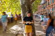 © JimBo - young woman reading in the street