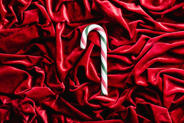 Christmas cane candy on red velvet