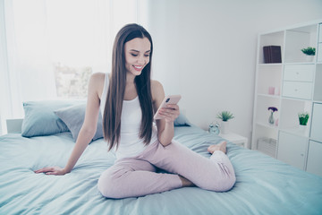 Sticker - Close-up portrait of her she nice beautiful attractive lovely charming cute sweet feminine cheerful cheery girl using 5g app sitting on sheets in white light interior room house indoors