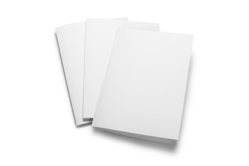 Folded sheets of white paper, isolated on white background