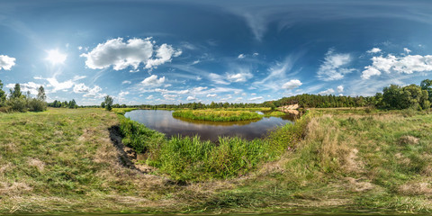 Wall Mural - seamless spherical hdri panorama 360 degrees angle view on grass coast of huge lake or river in sunny summer day and windy weather with beautiful clouds in equirectangular projection, VR content