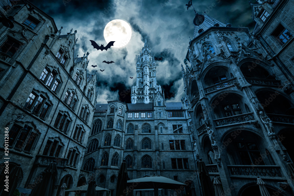 Scary dark scene with moon and bats. Fantasy horror for Halloween theme. Marienplatz at night, Munich, Germany.  - obrazy, fototapety, plakaty 