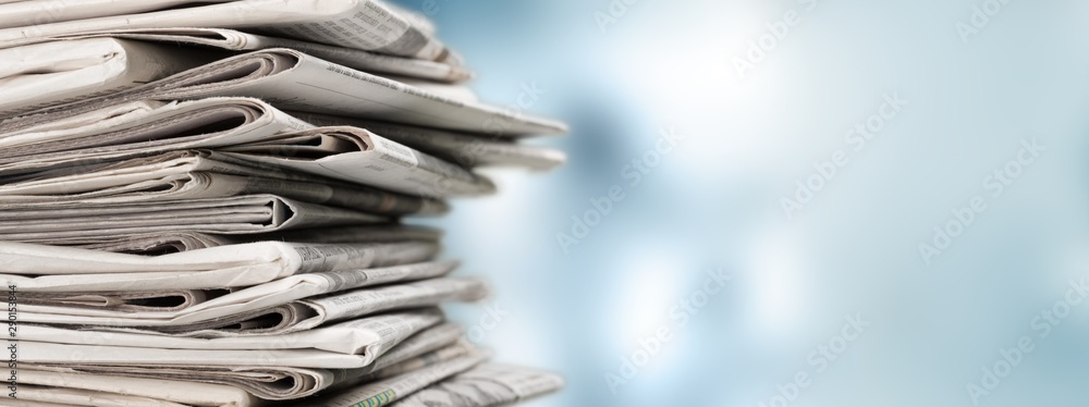 Pile of newspapers on white background - obrazy, fototapety, plakaty 