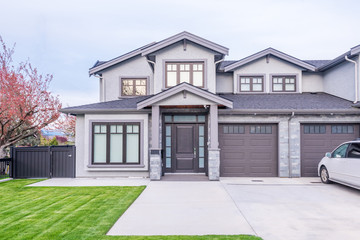 Houses in suburb at Summer in the north America. Luxury houses with nice landscape.