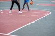 © rushay - Basketball player dribbling ball during match