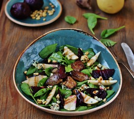 Sticker - salad with fried chicken liver, beets, gorgonzola cheese, pear, cashew nuts, mini spinach.