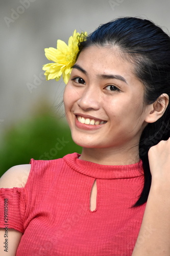 Smiling Cute Asian Teen Girl With Flowers Stock Photo Adobe Stock