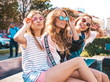 © halayalex - Portrait of three young beautiful smiling hipster girls in trendy summer clothes. Sexy carefree women posing on the street background.Positive models having fun in sunglasses.Hugging