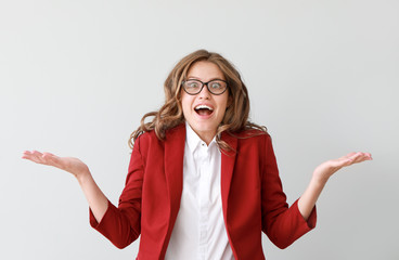 Sticker - Portrait of happy young businesswoman on light background