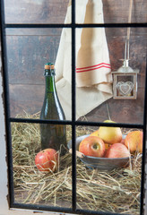 Wall Mural - Bottle of cider with apples on the straw