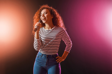 Sticker - Beautiful African-American female singer with microphone on stage