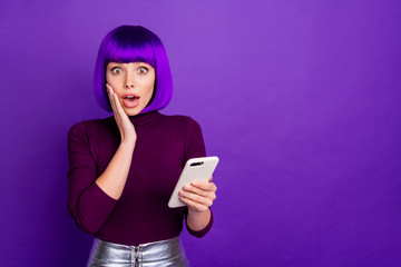 Poster - Photo of speechless lady holding telephone hands wear trendy clothes and wig isolated purple background