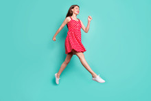Full Size Photo Of Cute Lady Running Wearing Dotted Skirt Dress Isolated Over Green Teal Turquoise Background
