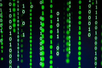 Background matrix style.Green is dominant color.code in green color.data in binary code.computer virus and hacker screen wallpaper.