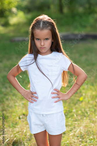 pix Summer Nature Outdoor Photography Poses For Female https stock adobe com images displeased little girl with long brown hair posing summer nature outdoor angry kid s portrait beautiful child s face 290242041 start checkout 1 content id 290242041