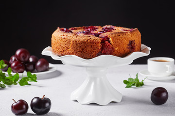 Canvas Print - famous plum torte on a cake stand