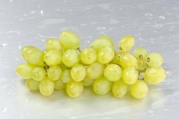 Canvas Print - Bunch of Washed Green Grapes on Metal Plate