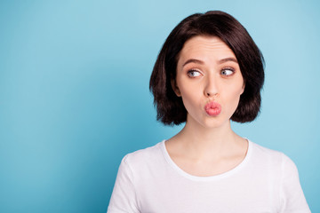 Wall Mural - Close-up portrait of her she nice attractive charming cute funny girl looking aside pout lips isolated over bright vivid shine vibrant blue turquoise color background