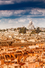 Wall Mural - Aerial View on Montmartre Hill and Sacre-Coeur Church. Urban Paris city skyline at hot summer