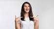 © Prostock-studio - Self-Confident Woman Pointing Fingers At Herself On White Background, Panorama