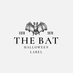 Wall Mural - premium quality halloween logo or label template. hand drawn evil bat sketch symbol and retro typogr