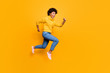 © deagreez - Full length body size photo of cheerful cute pretty hurrying running black skinned girlfriend going to shopping mall wearing pullover jeans denim footwear isolated vivid color background