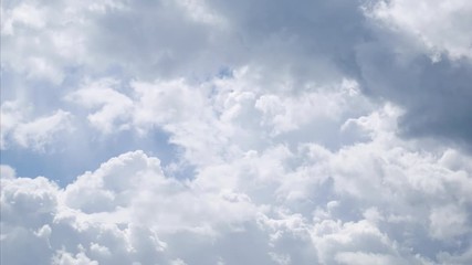 Wall Mural - time lapse of white cloud on blue sky. 4k fluffy white clouds moving during the day time