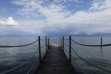  Pontoon to the Leman lake with clouds