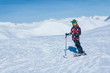 © Microgen - Young Skier on Top of Ski Resort