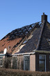 © Marcel/Stocksy - Old farmhouse with burned down roof