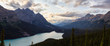 Canadian Rockies and Peyto Lake viewed from the top of a mountain during a vibrant summer sunset. Taken in Icefields Parkway, Banff National Park, Alberta, Canada.