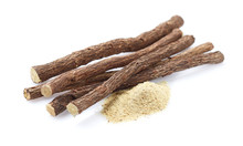 Licorice Powder With Licorice Roots On White Background