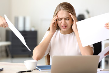 Wall Mural - Woman having panic attack at workplace